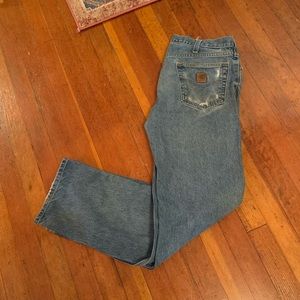 Vintage Carhartt Jeans with the leather patch. Size 36x34.